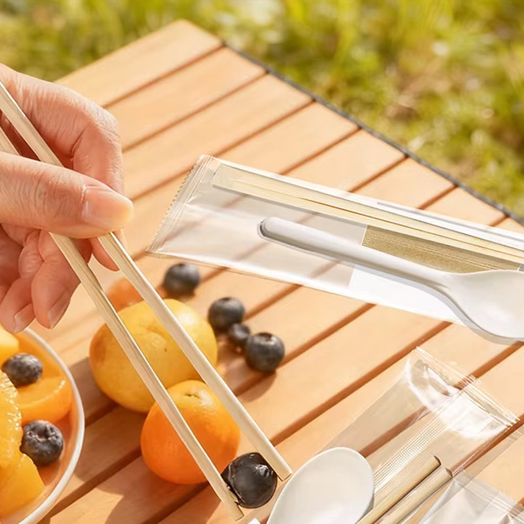 Opsticle Disposable tableware, namely, knives, forks and spoons